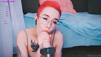 Cute Girl Gives A Blowjob To A Sex Machine